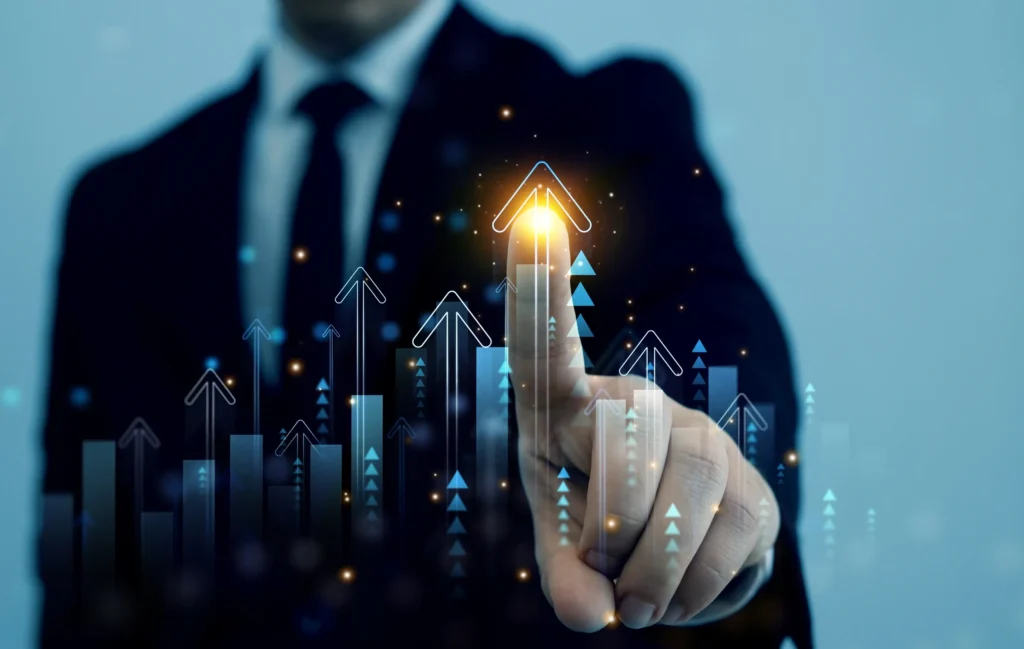 Businessman touching virtual upward arrows graph.